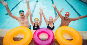 Four older adults in the pool staying fit